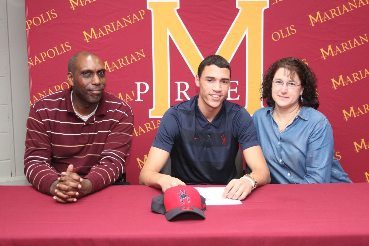 Tyler Burton 19 signs with the University of Richmond Campus