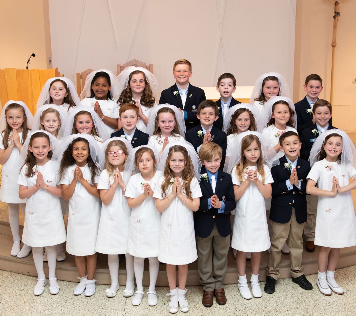 holy-child-community-celebrates-class-of-2025-first-holy-communion