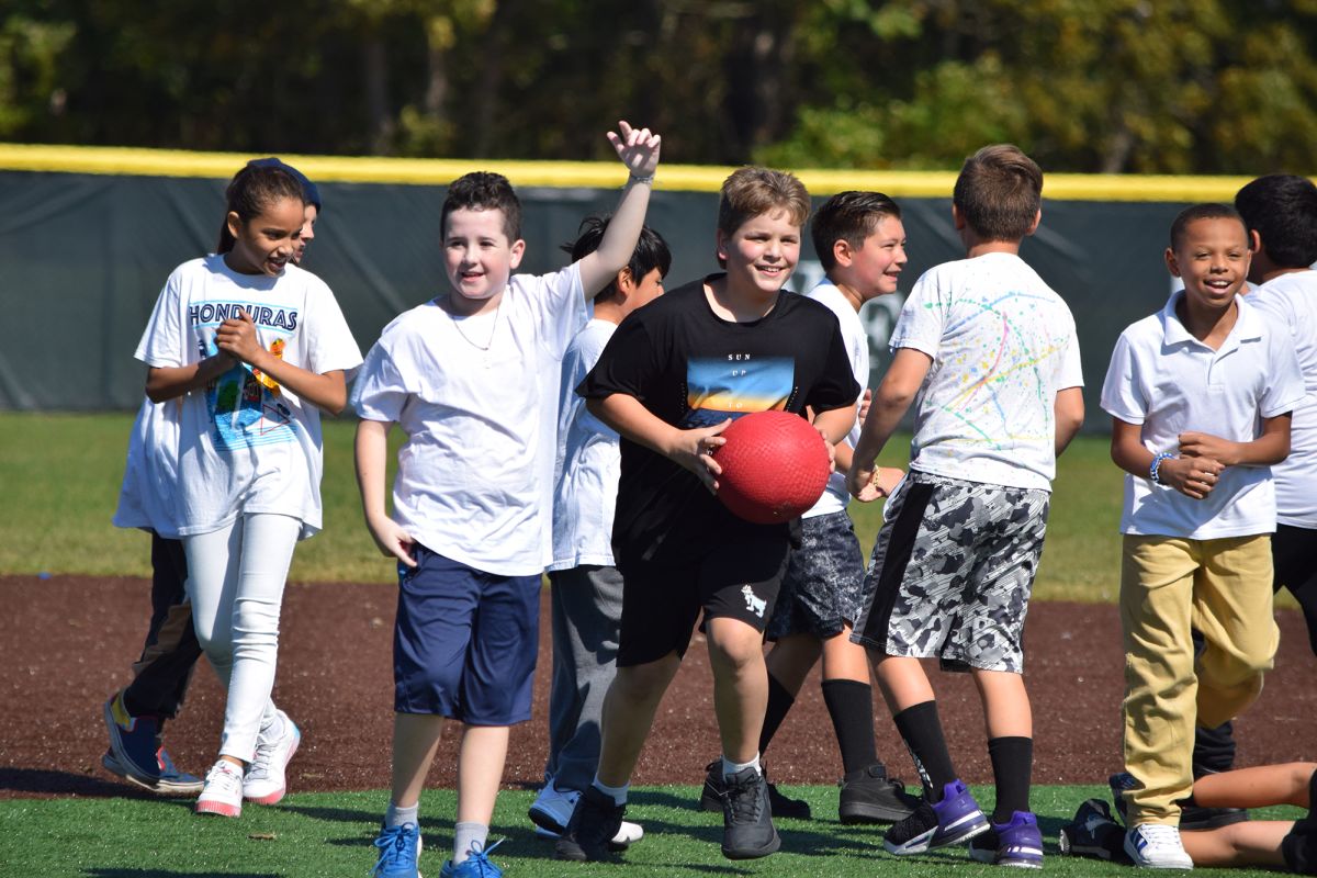 Tangier Smith Elementary School Fifth-Grade Students Play Kickball with ...