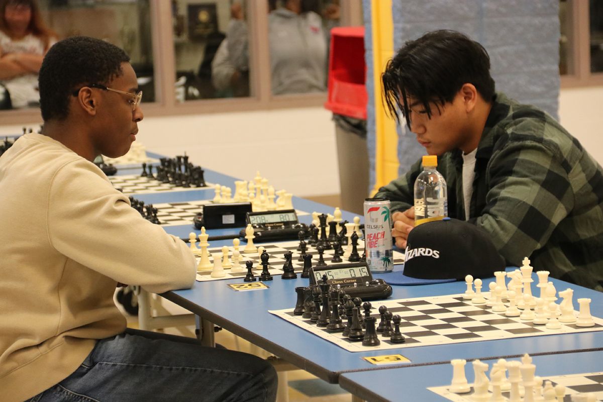 Students check out the CCPS winter chess tournament