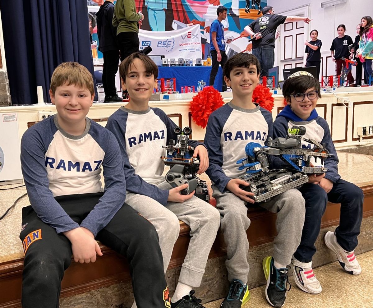 Pictures and Videos Our Middle School Robotics Team Plays in First