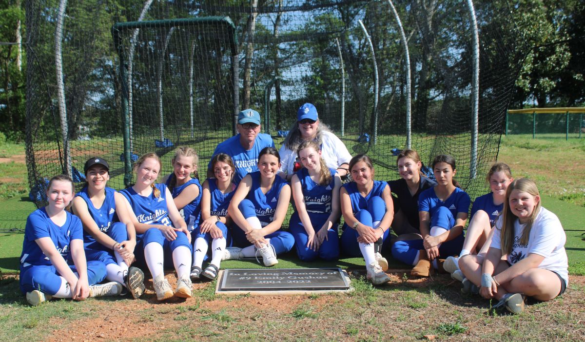 Softball Team Dedicates Batting Cage, Wins Big, Honors Senior Page