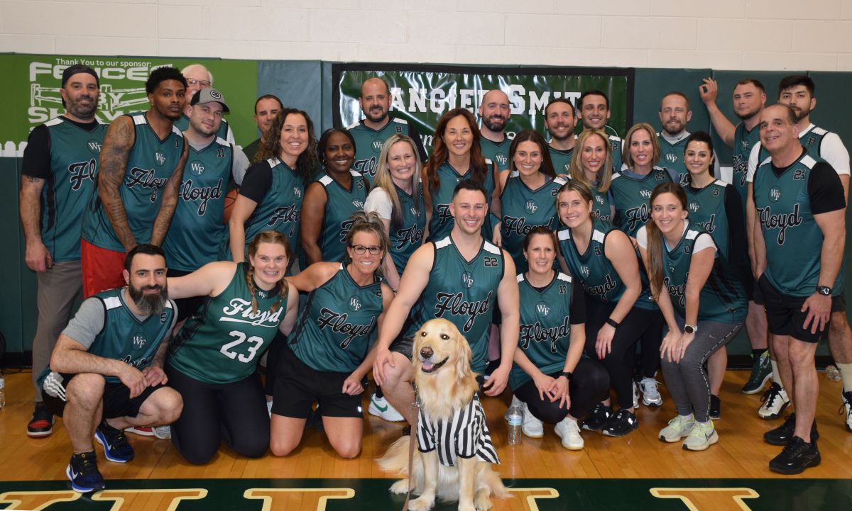 Slam Dunking for Charity: Tangier Smith and Hobart Faculty and Staff Take on the Harlem Wizards