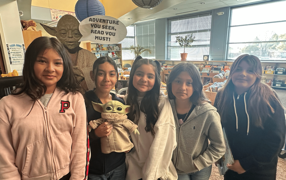 Leroy Elementary reads in a "Galaxy Far, Far Away" Details Leroy