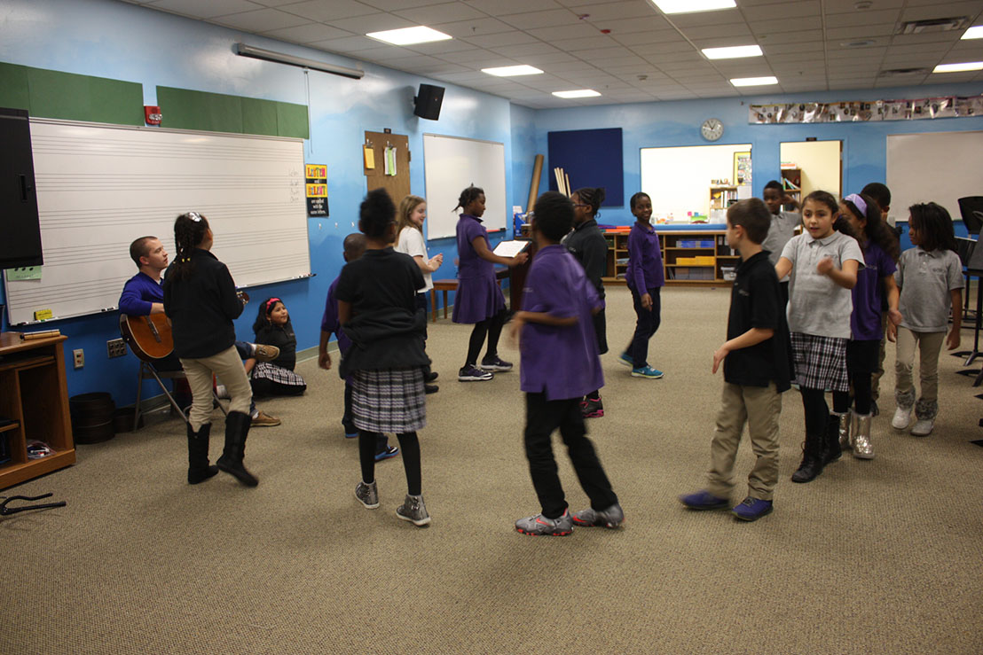 Students dancing in the Armleder music room