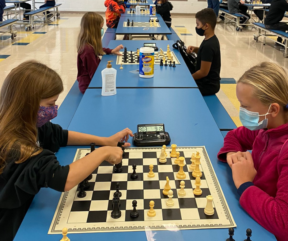 Students check out the CCPS winter chess tournament