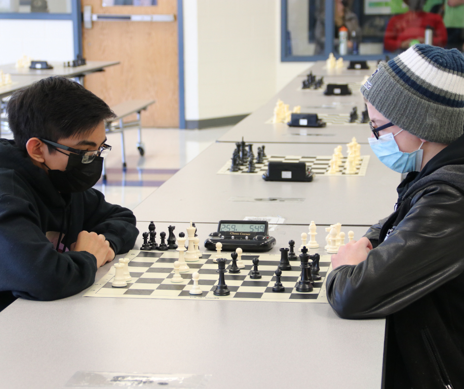 Students check out the CCPS winter chess tournament