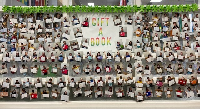 Cougar Ridge Community Donates Books | News Article - Cougar Ridge ...