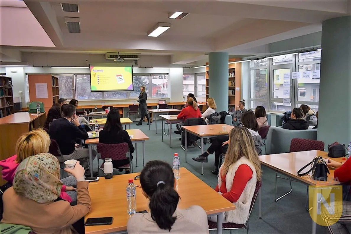 Parents attending a PTA coffee hour on bullying, aggression and harassment