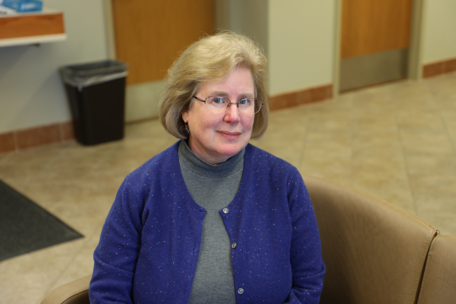 Adult Basic Education volunteer assists in English language classes article ISD 279 Osseo