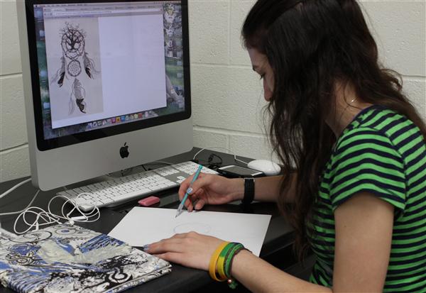 GD Co Illustrating on the Computer