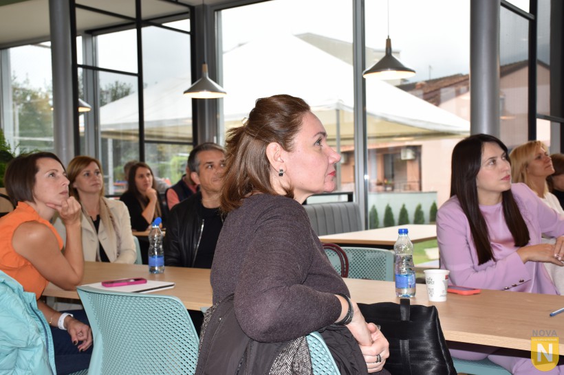 Parents listening attentively at the PTA coffee morning