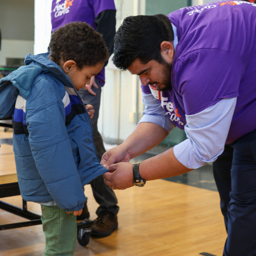 Whitney Avenue Elementary School students receive coats through