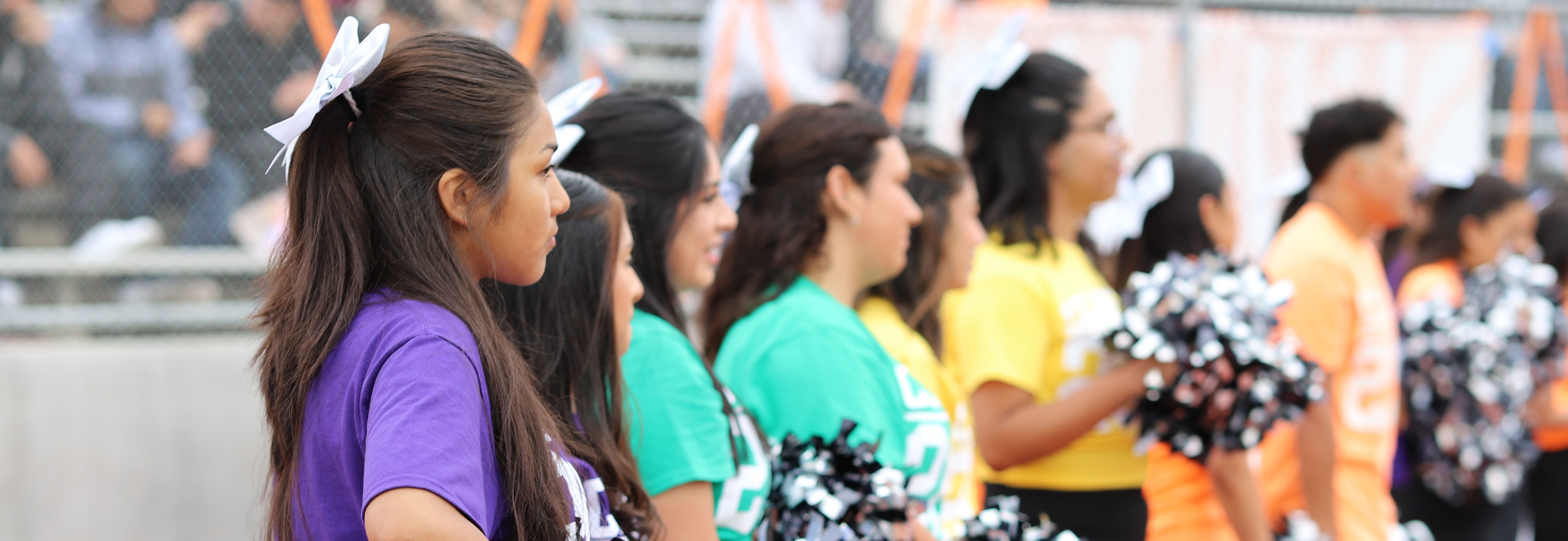 image of students with pom poms
