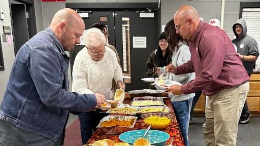 Staff enjoying Thanksgiving meal