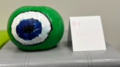Large Eyeball painted on a pumpkin