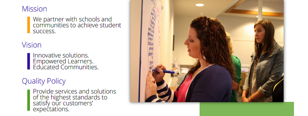 Woman writing on white board
