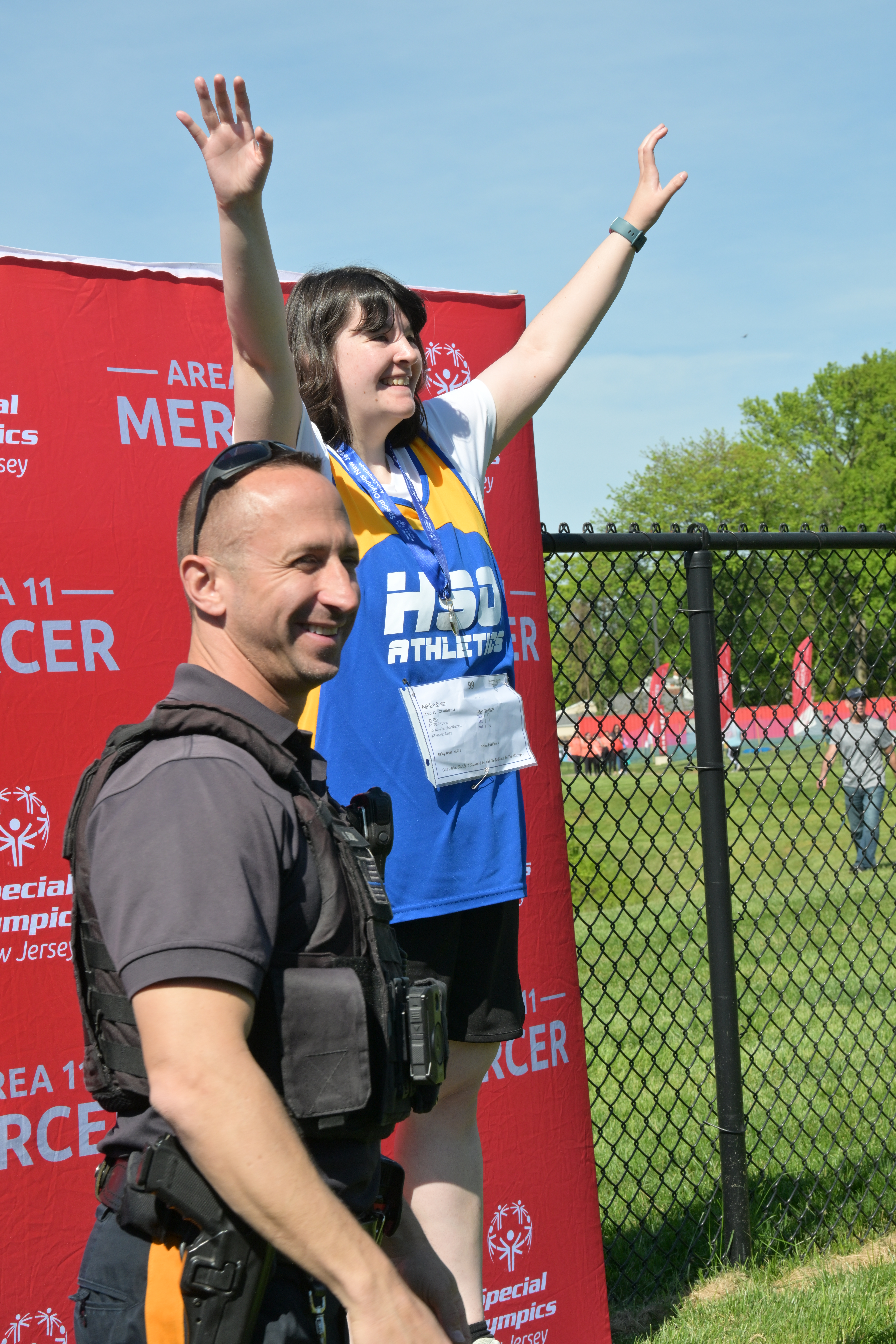Student and police officer at Special Olympics 