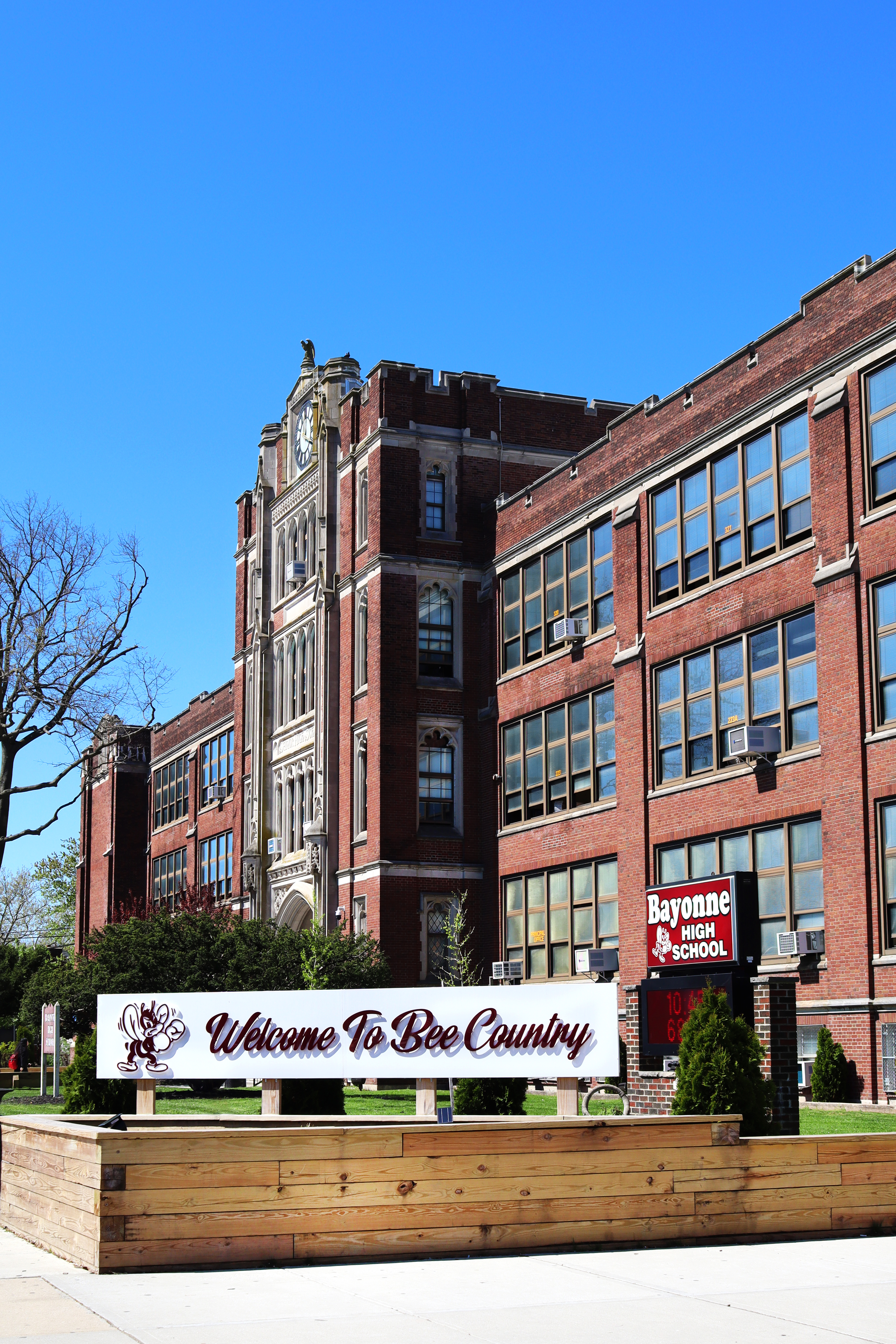 Displays Bayonne High School with sign that reads "Welcome to Bee Country"