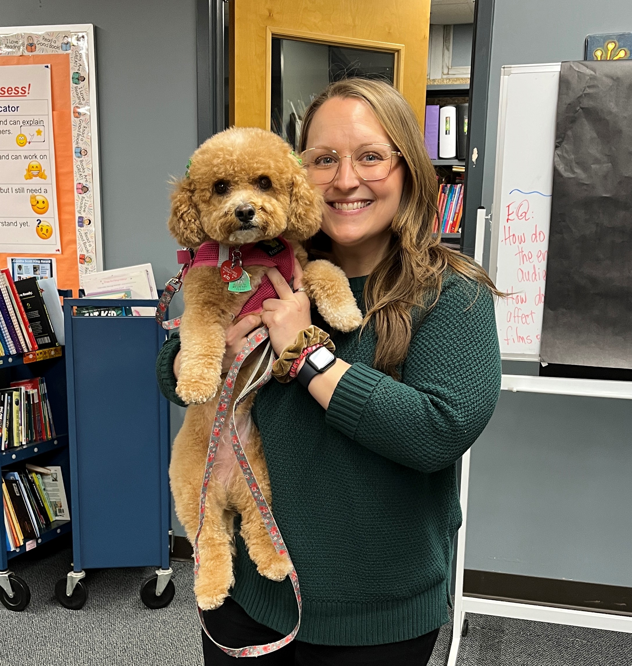 Phoebe the therapy dog with handler