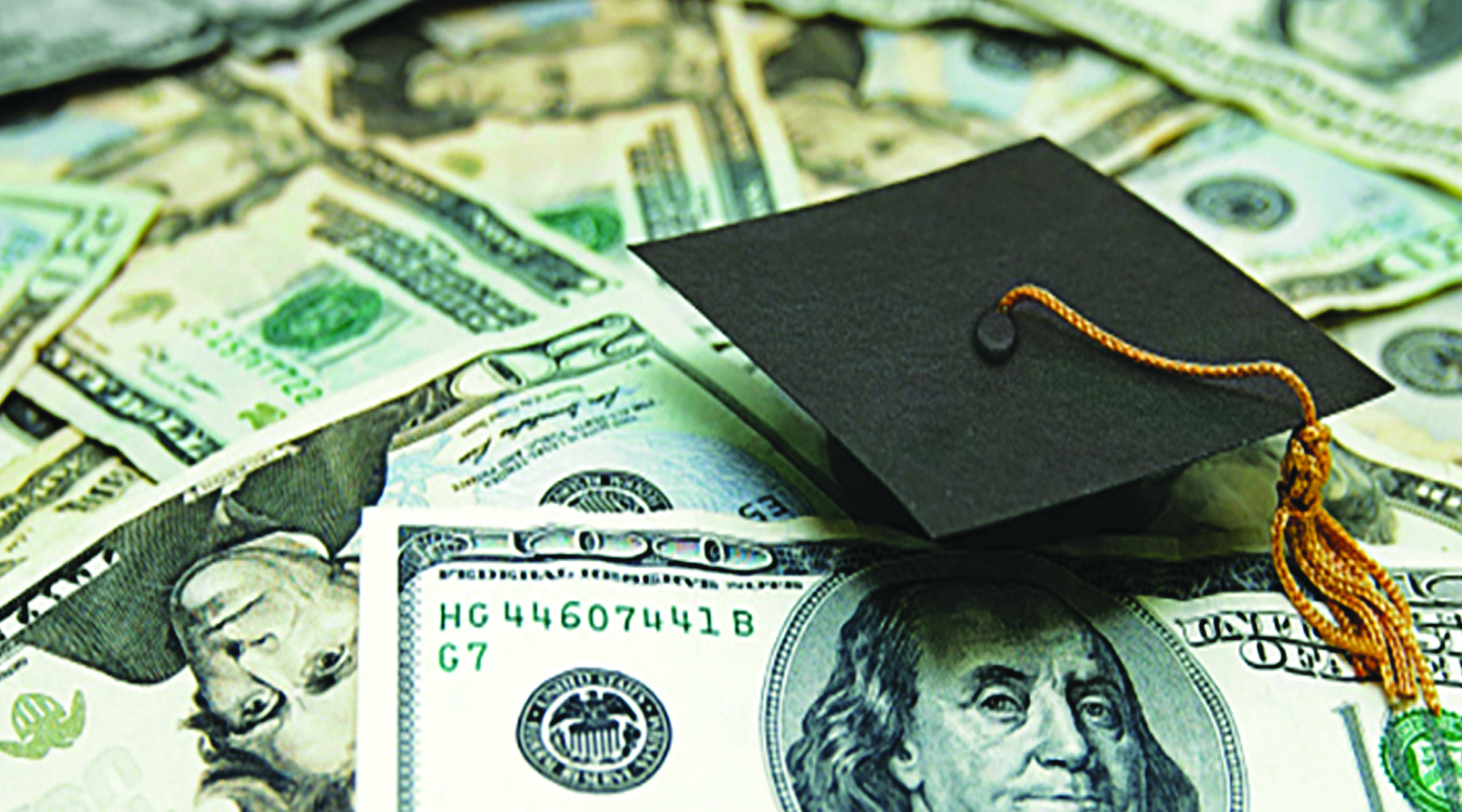 Financial Aid: Pile of Money with Graduation Cap