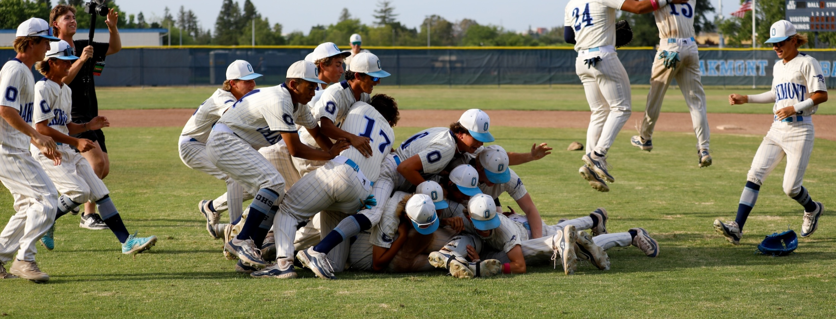 Oakmont baseball team celebrates on the field
