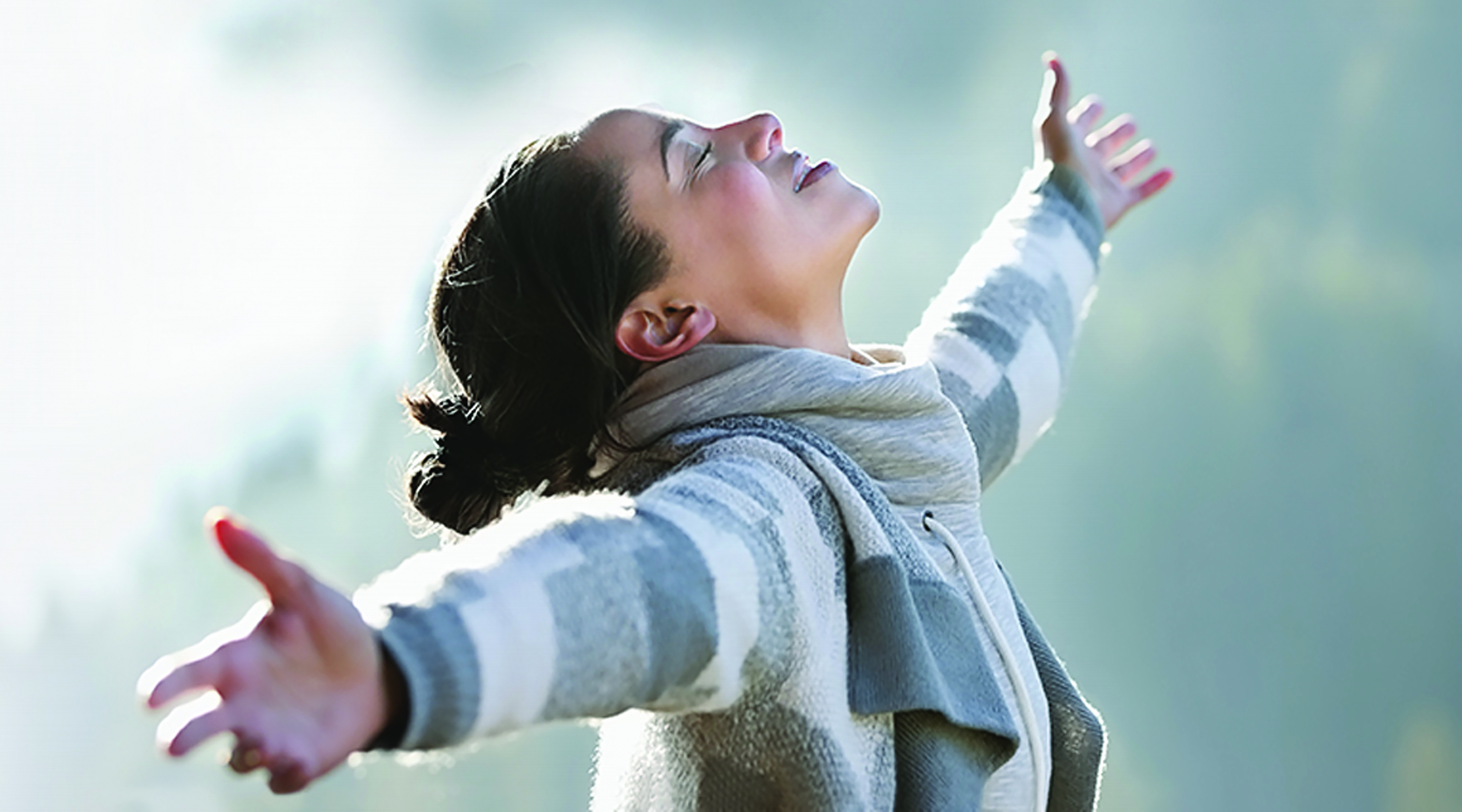 Girl with Eyes Closed and Arms Stretched-Out Wide