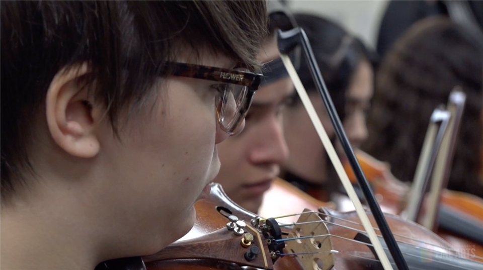 Student playing violin