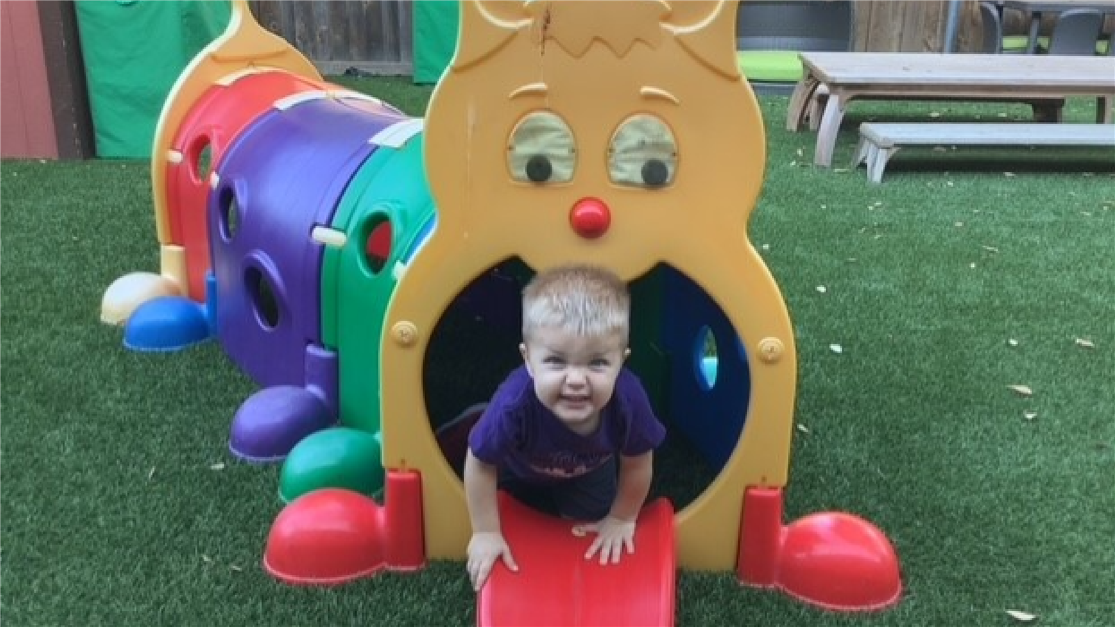Boy playing in caterpillar