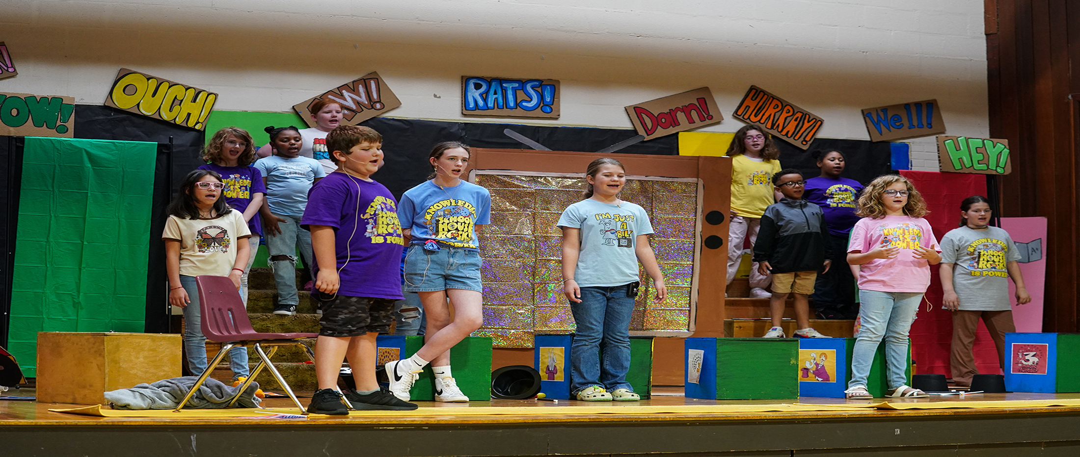students perform School House Rock on stage