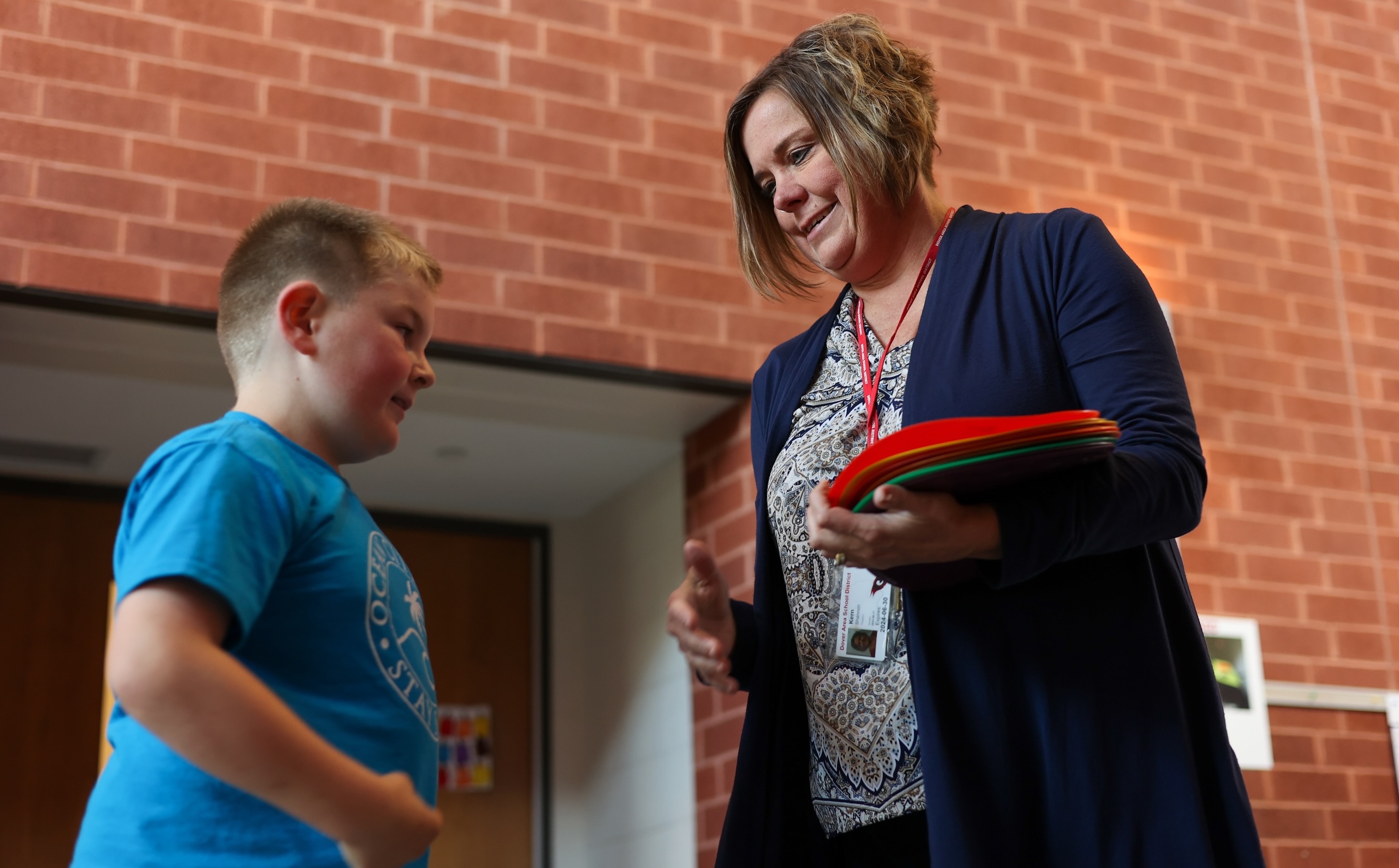Teacher working with student