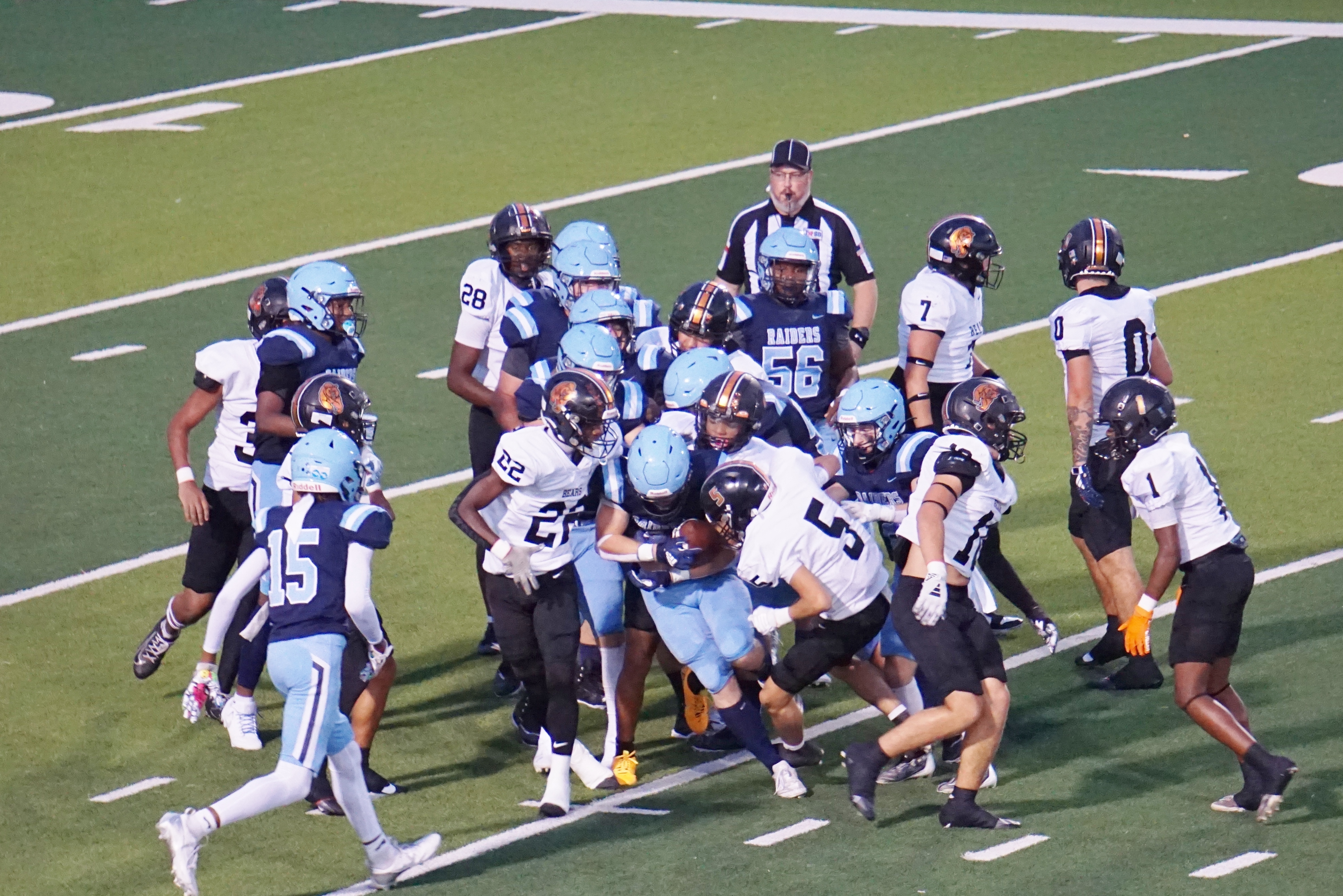 West Rusk High School students playing football