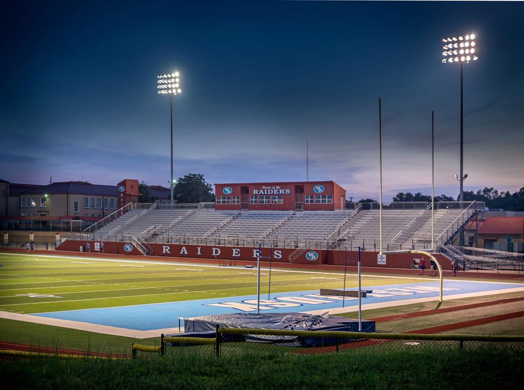 The West Rusk CCISD Football Stadium with lights on