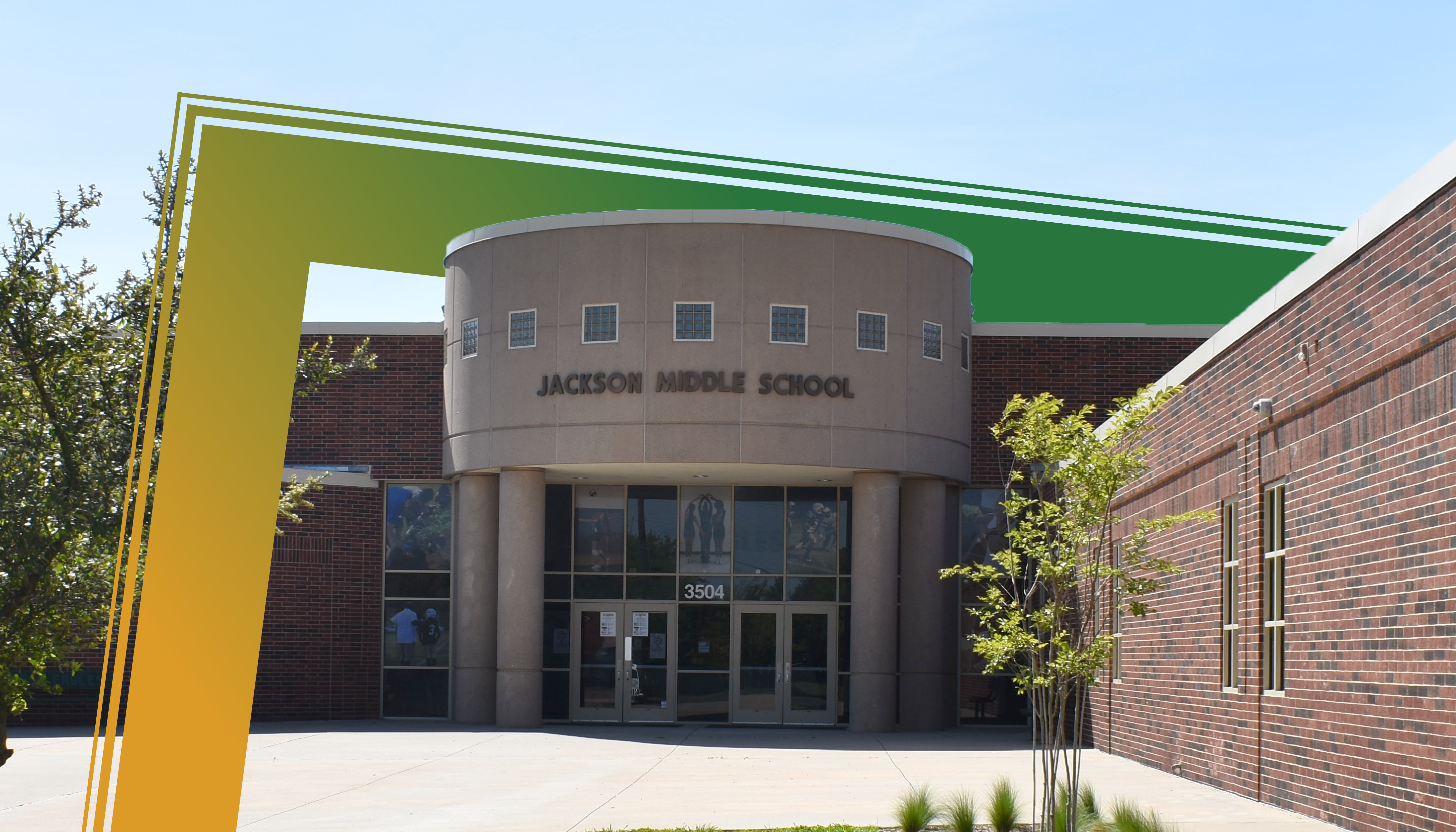 The image shows the entrance to Jackson Middle School, a brick building with a rounded, domed entrance and large windows. The building is surrounded by trees and greenery, with a bright green and yellow color scheme on the exterior.