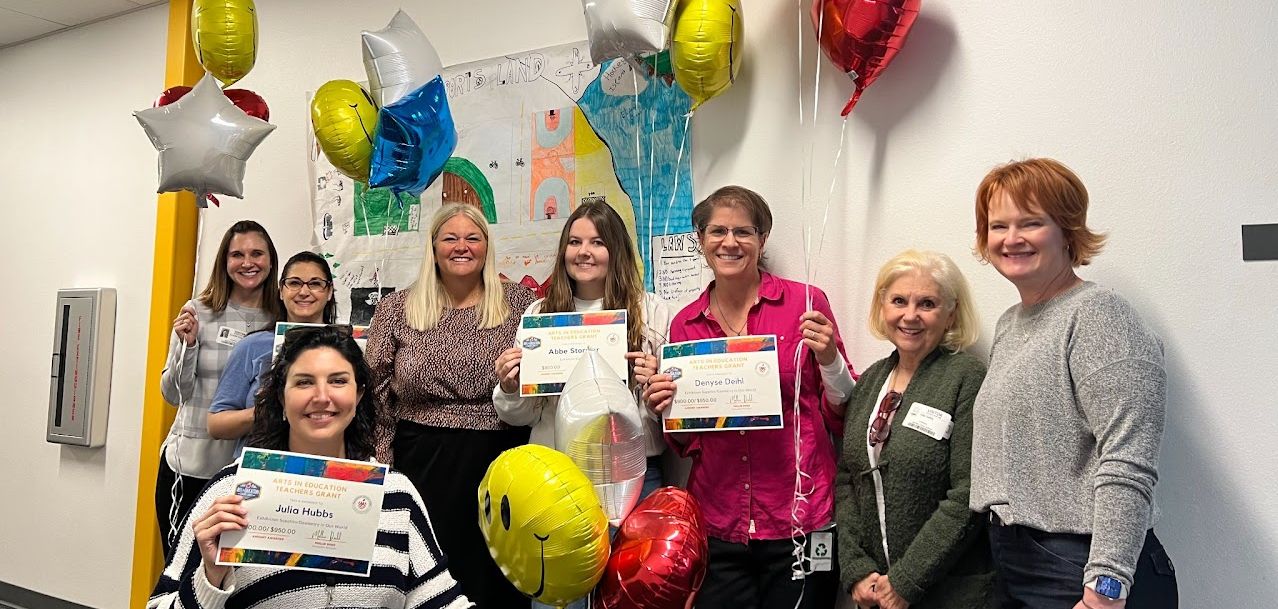 Madison Education Foundation awarding grants to teachers with balloons