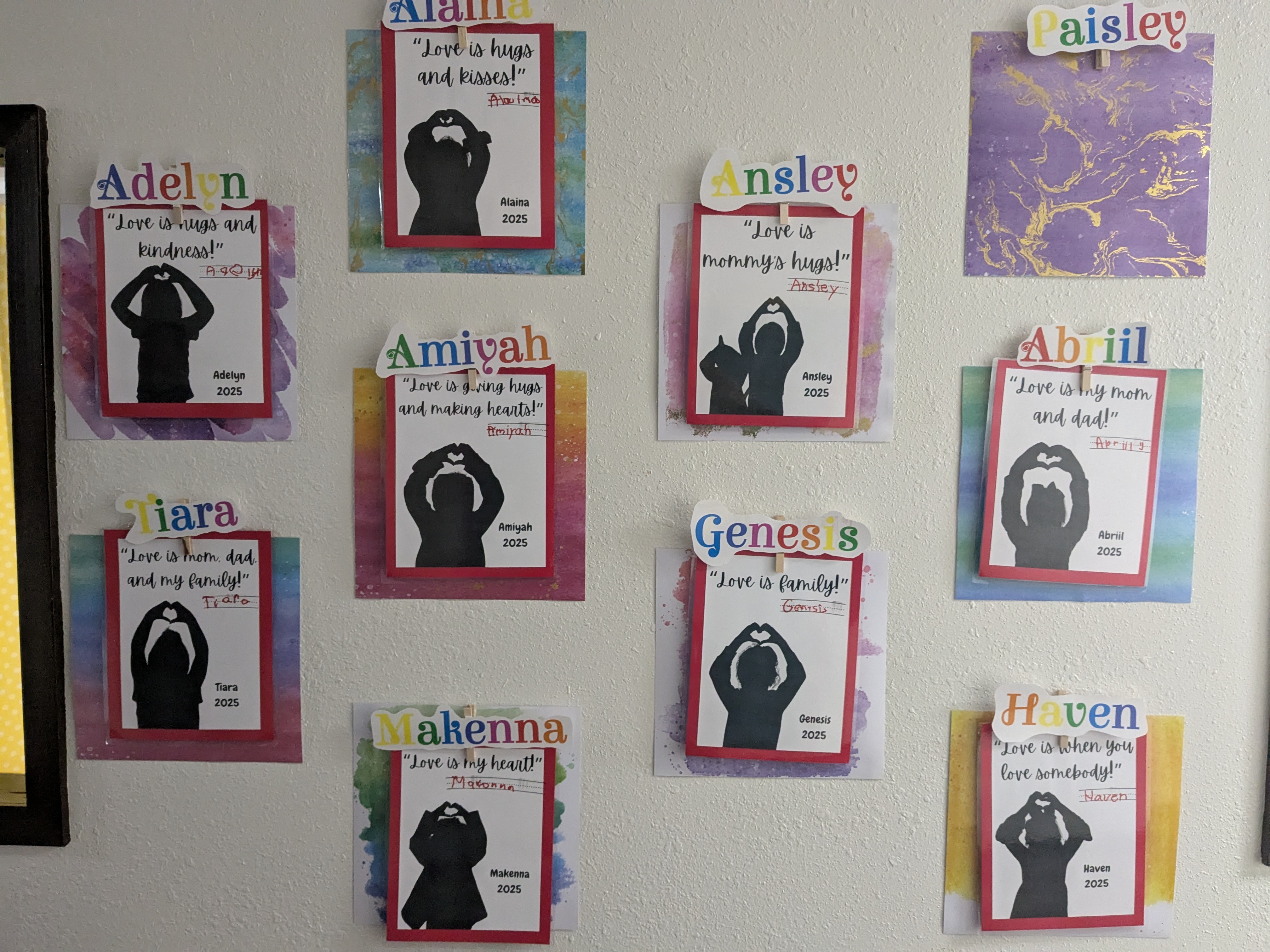 9 pictures on the wall of students shadow outlines