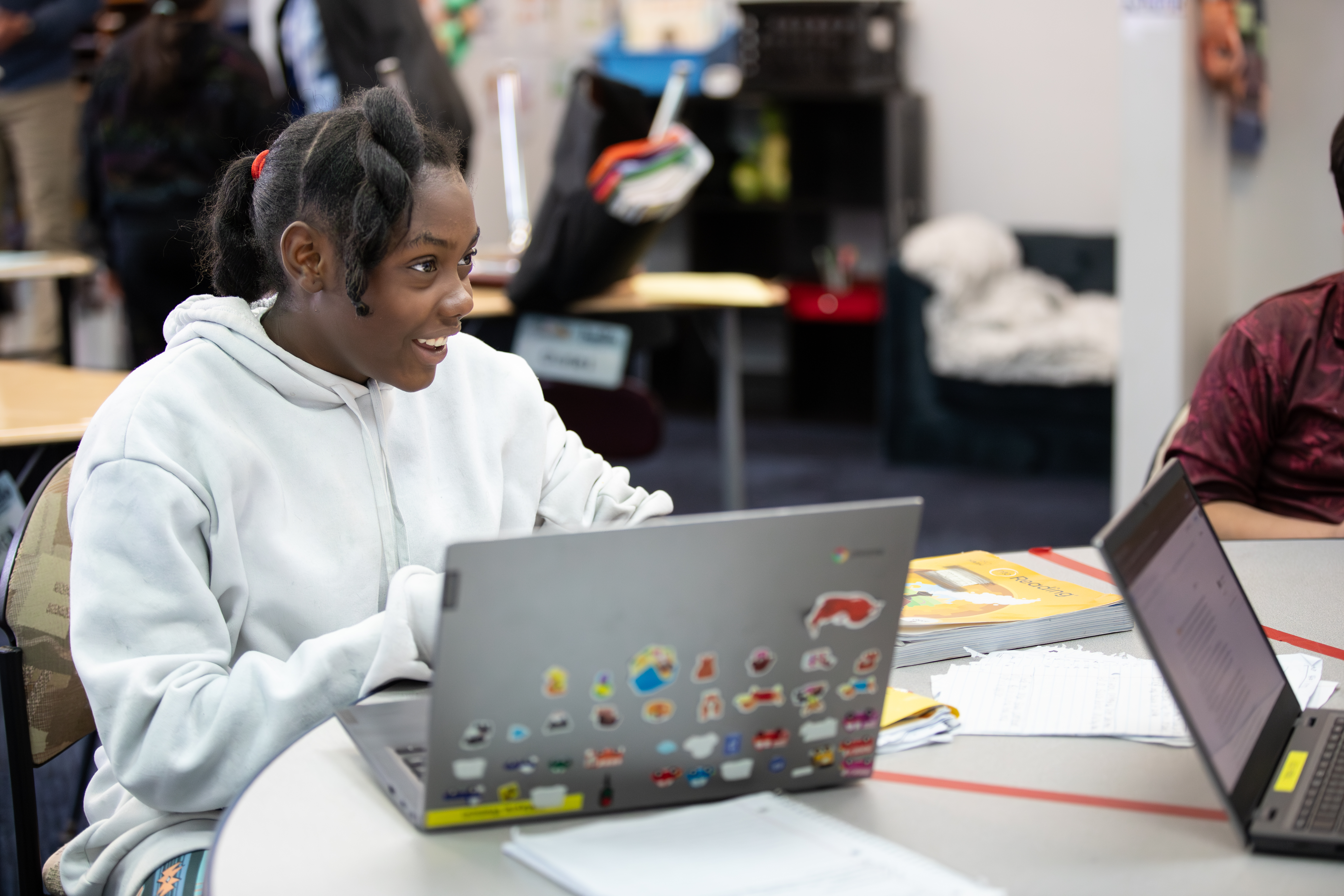 Students engaging in hands on activities in class.