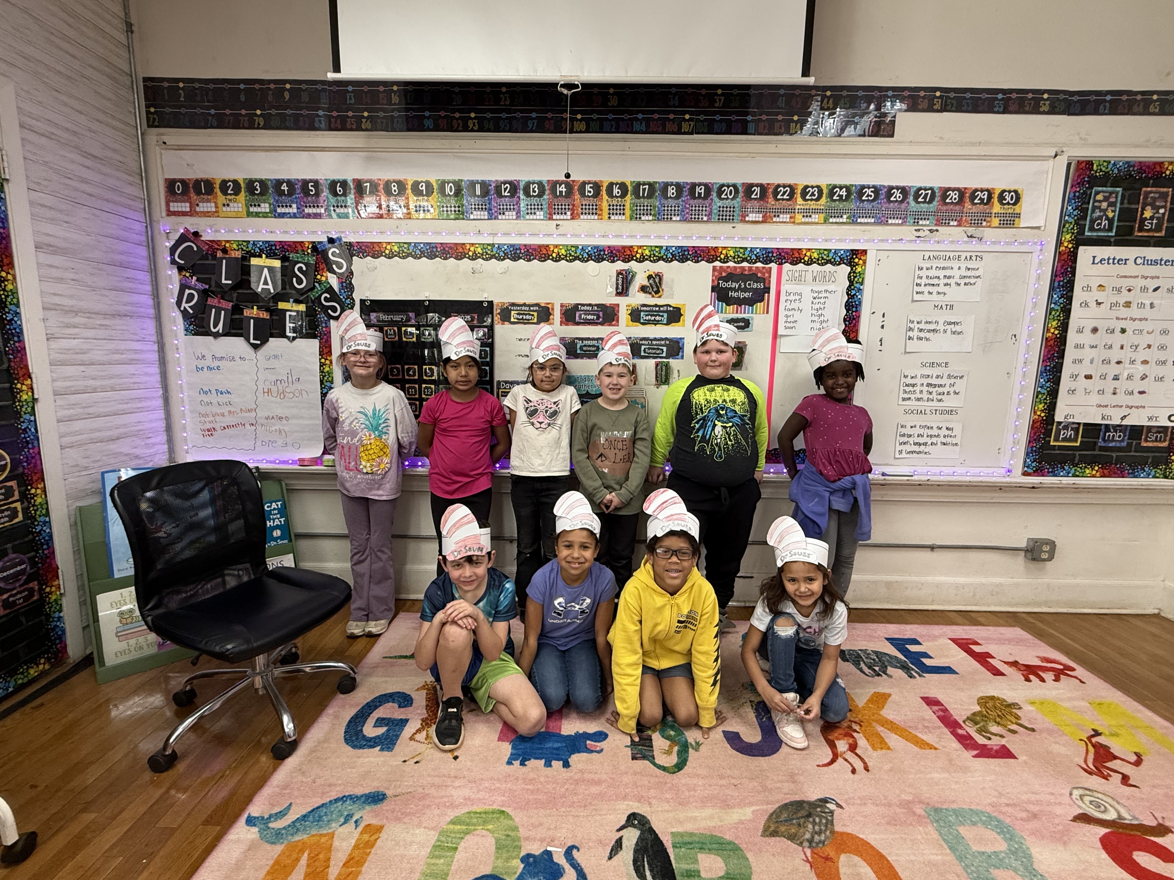 West Rusk Elementary students in their classroom with Dr Seuss hats on