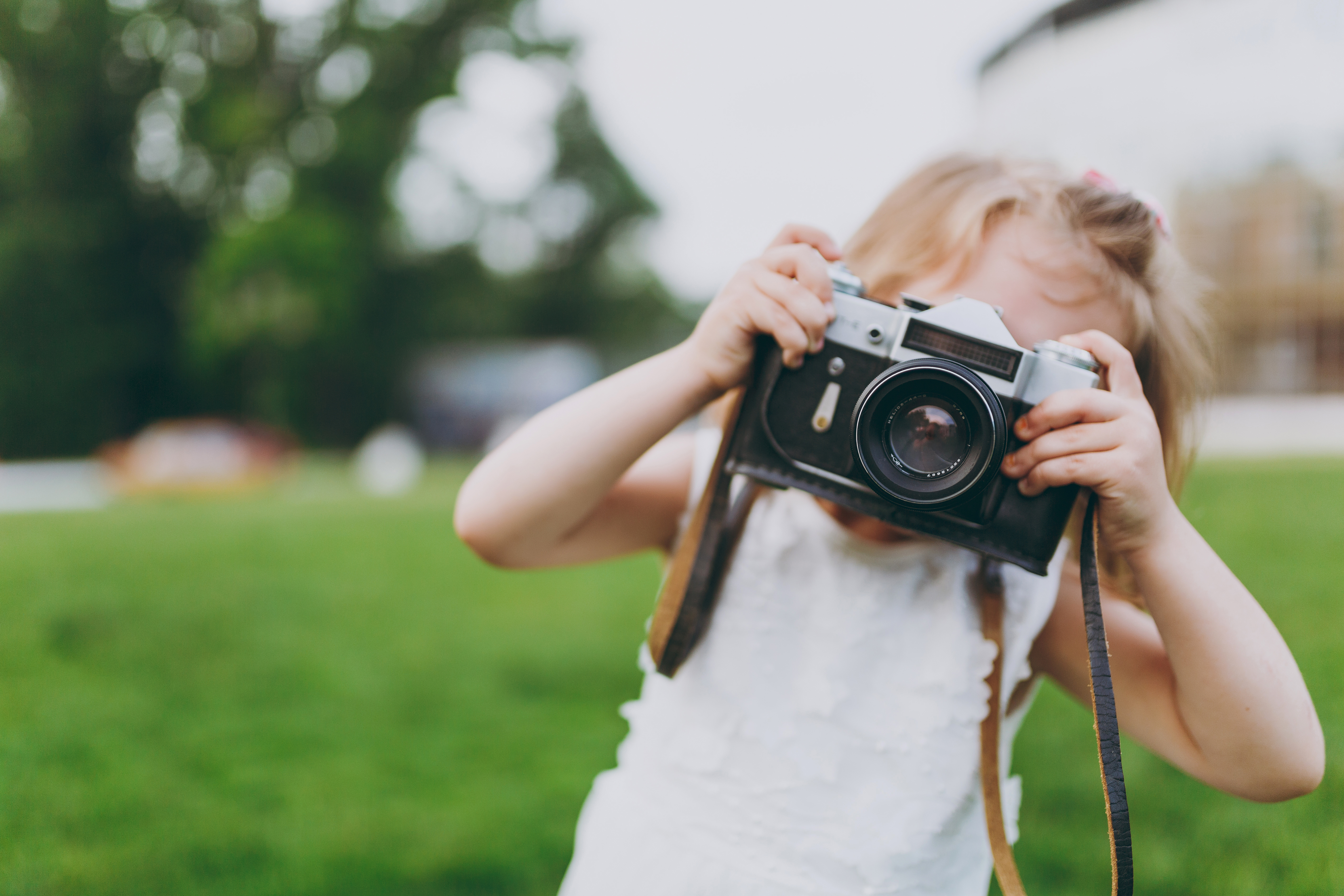 Girl Holding Camera