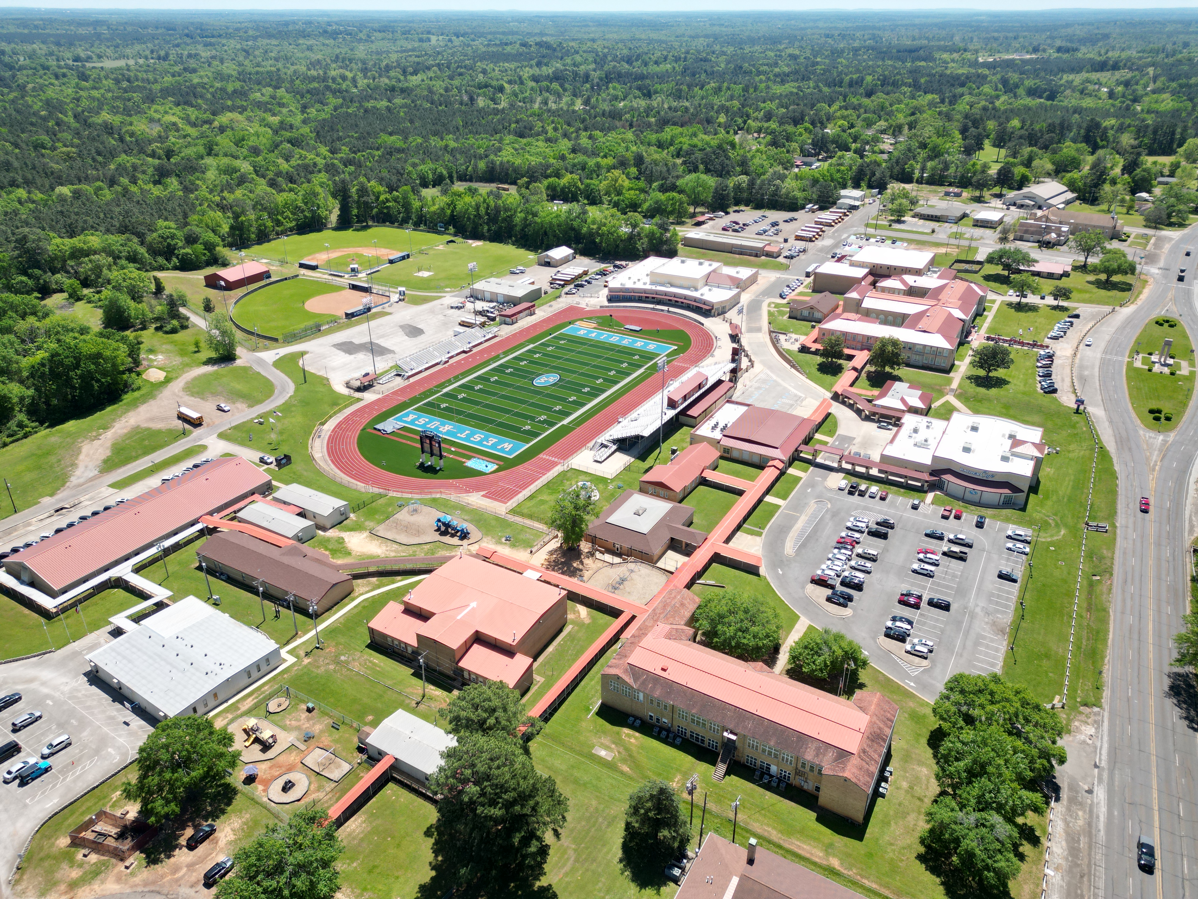 An overhead picture of West Rusk CCISD buildings, stadium and fields.