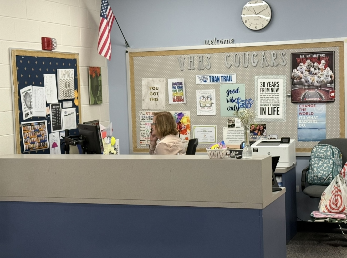 LST Support Staff Member working at her desk in an LST