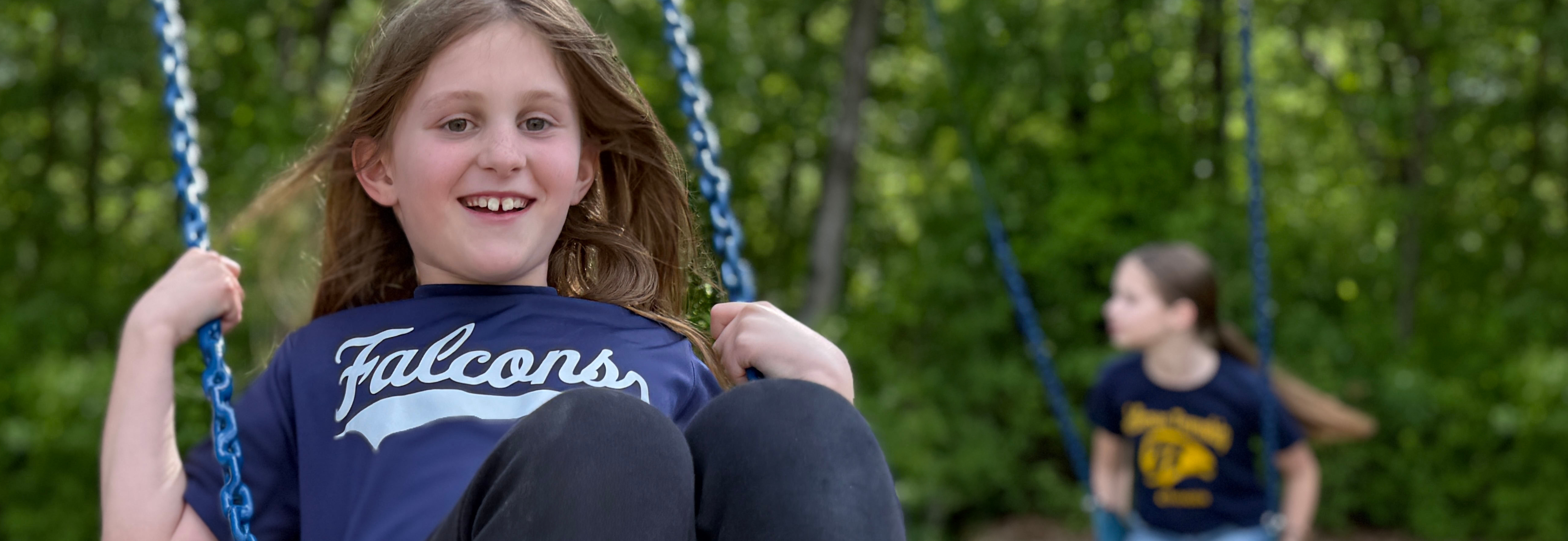 Girls on swings