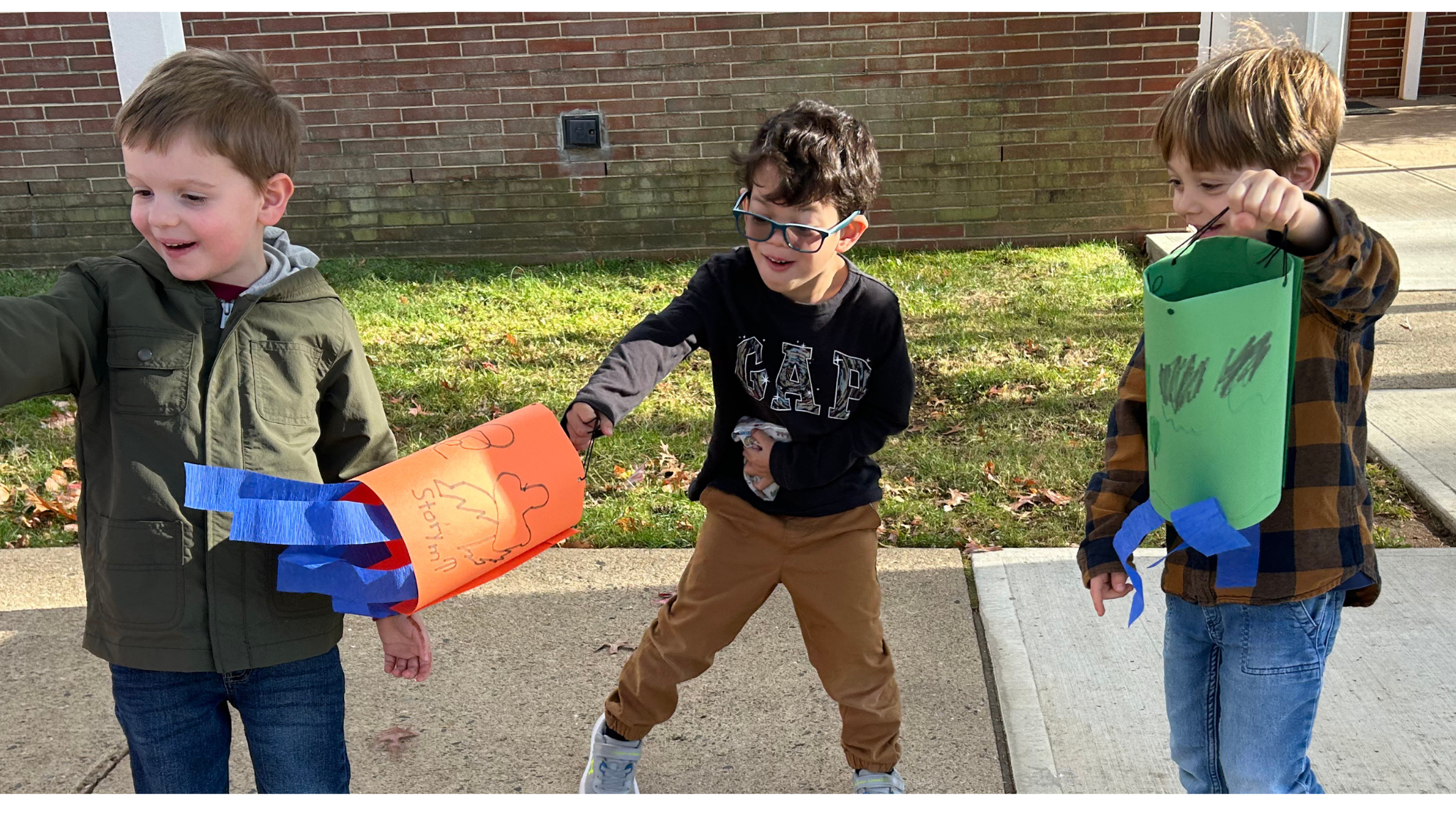 children with paper lanters