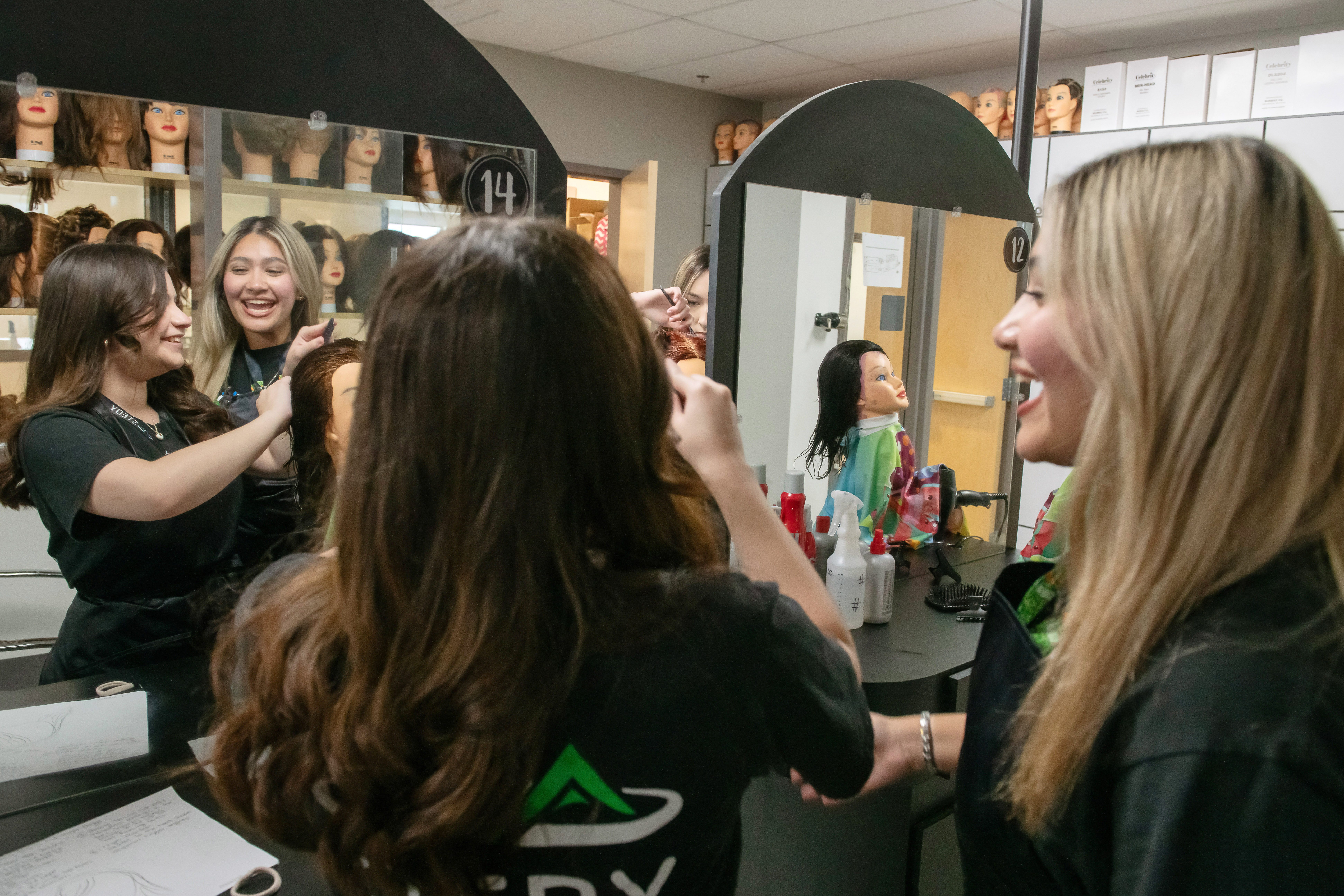 Hairstyling Students practicing haircutting 
