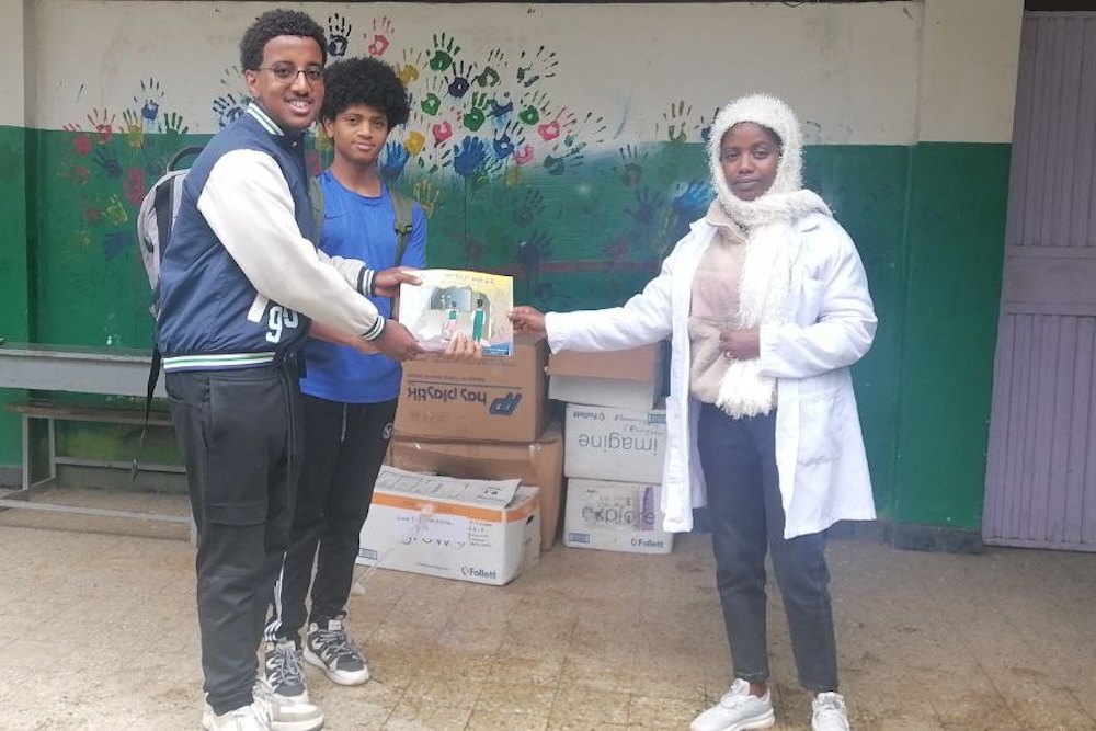 Notebook Distribution Student Leads Book Donation Project to Local Organizations | ICS News