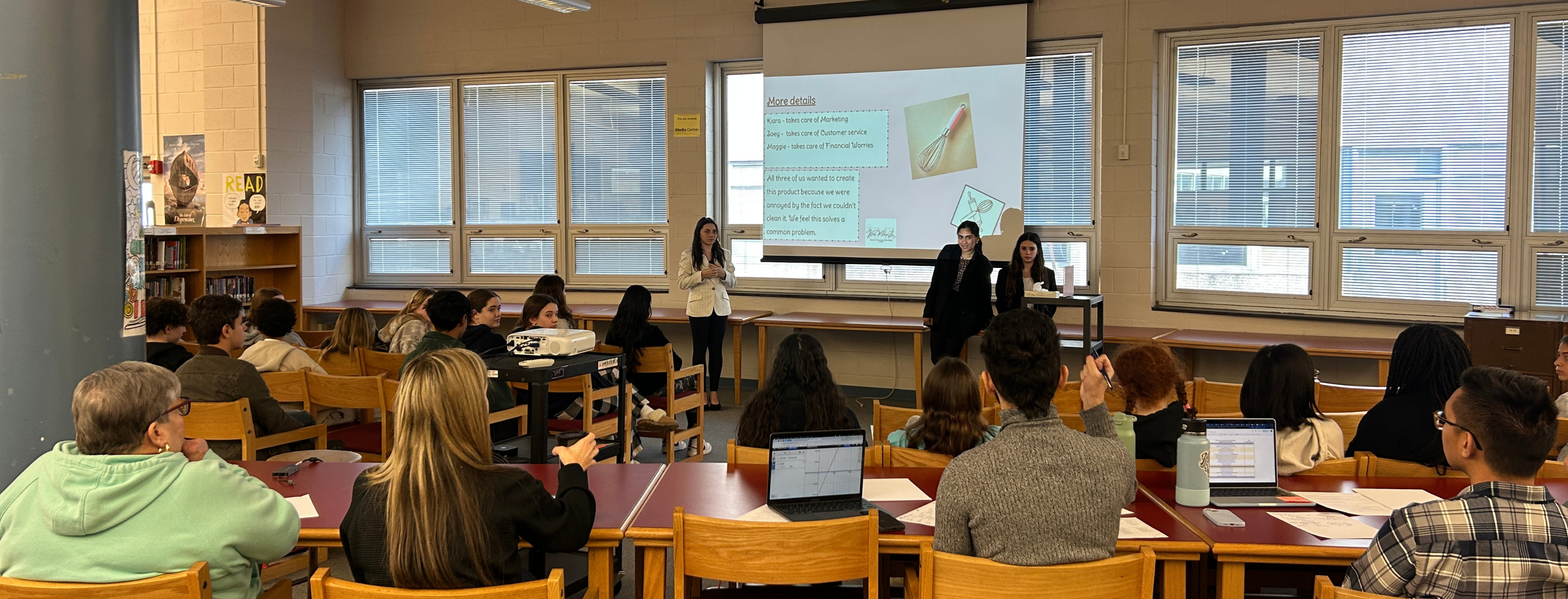 Terril students listening to class presentation