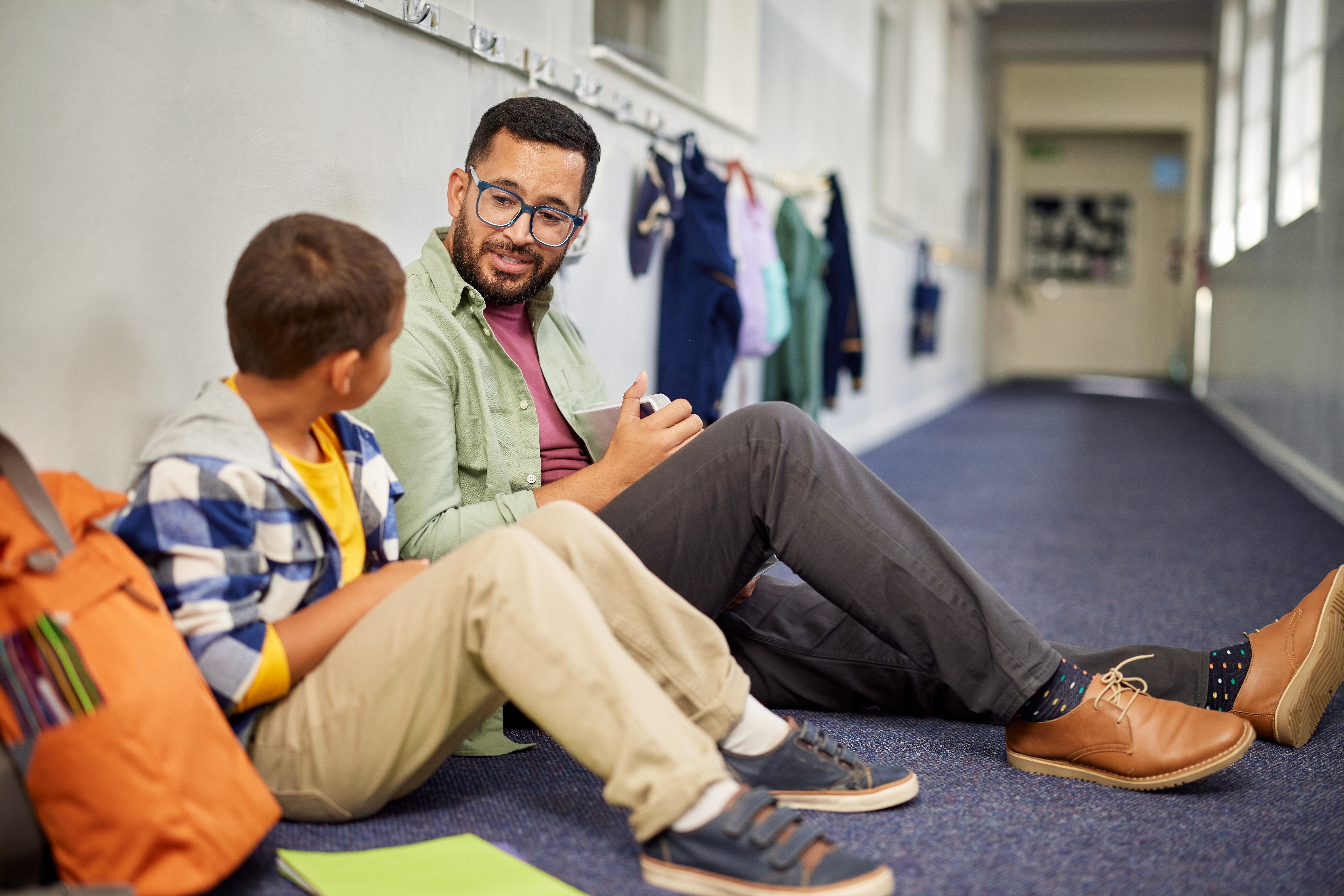 Staff talking to student