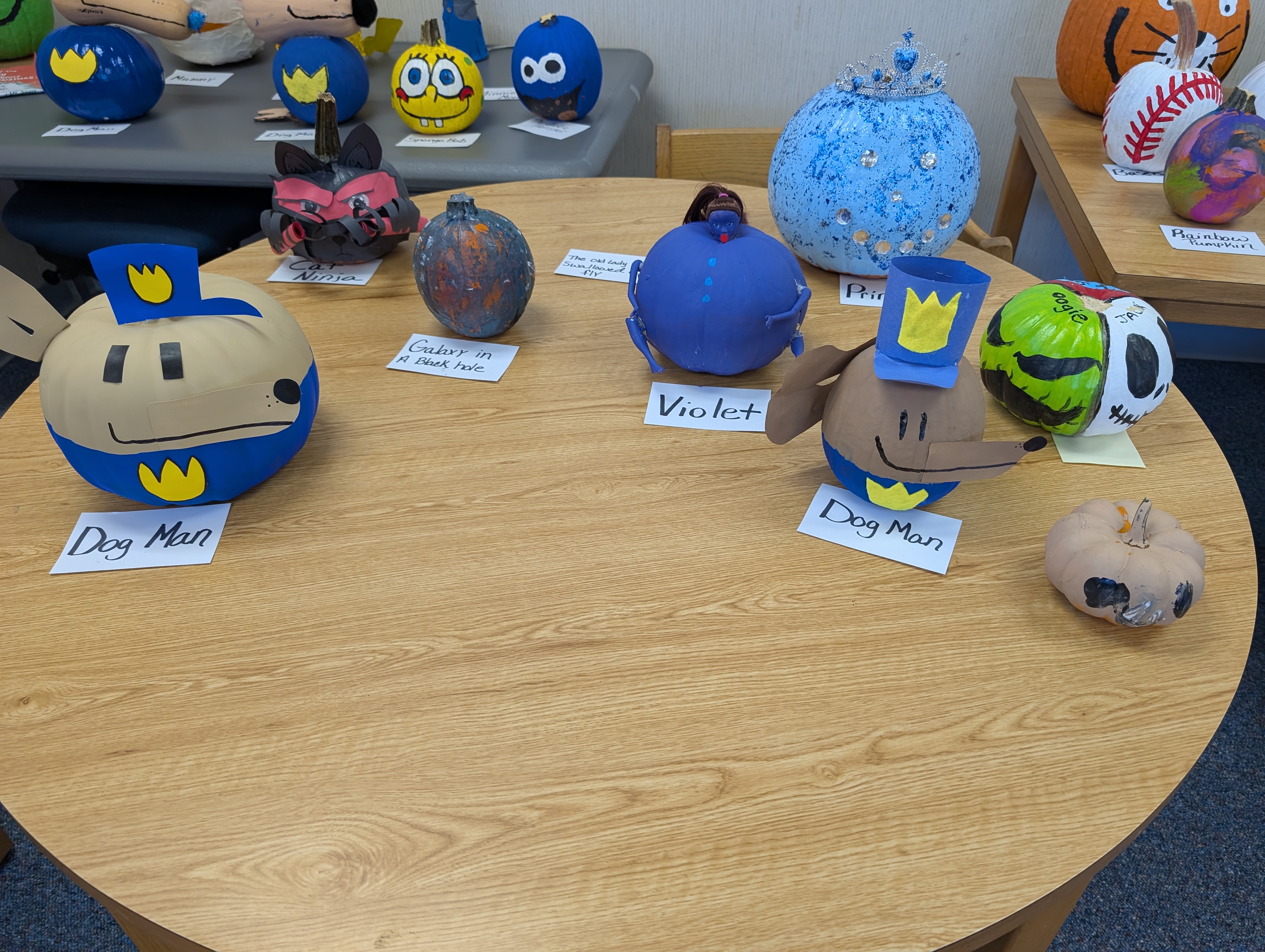 Book character pumpkins painted by West Rusk elementary students
