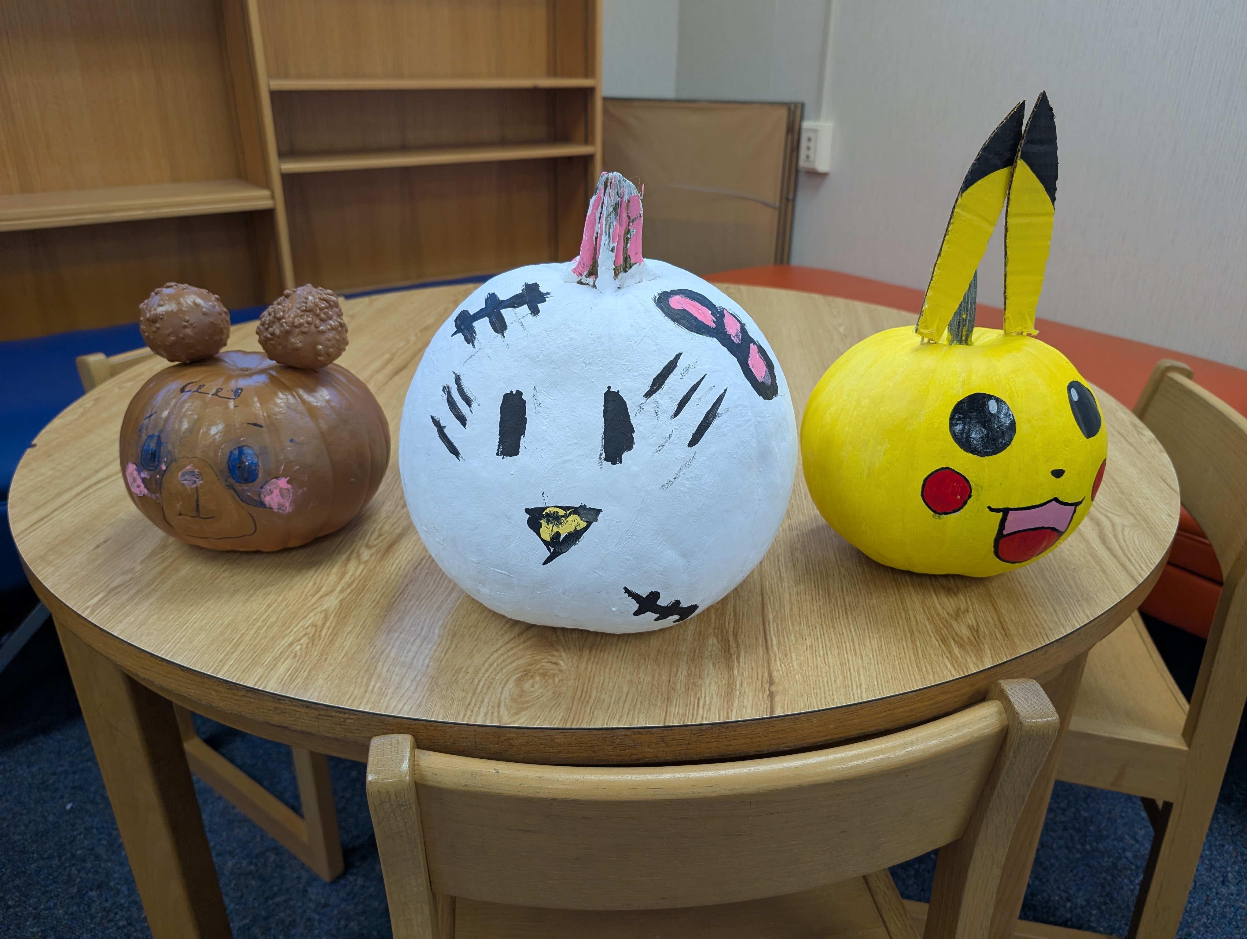 Book character pumpkins painted by West Rusk elementary students