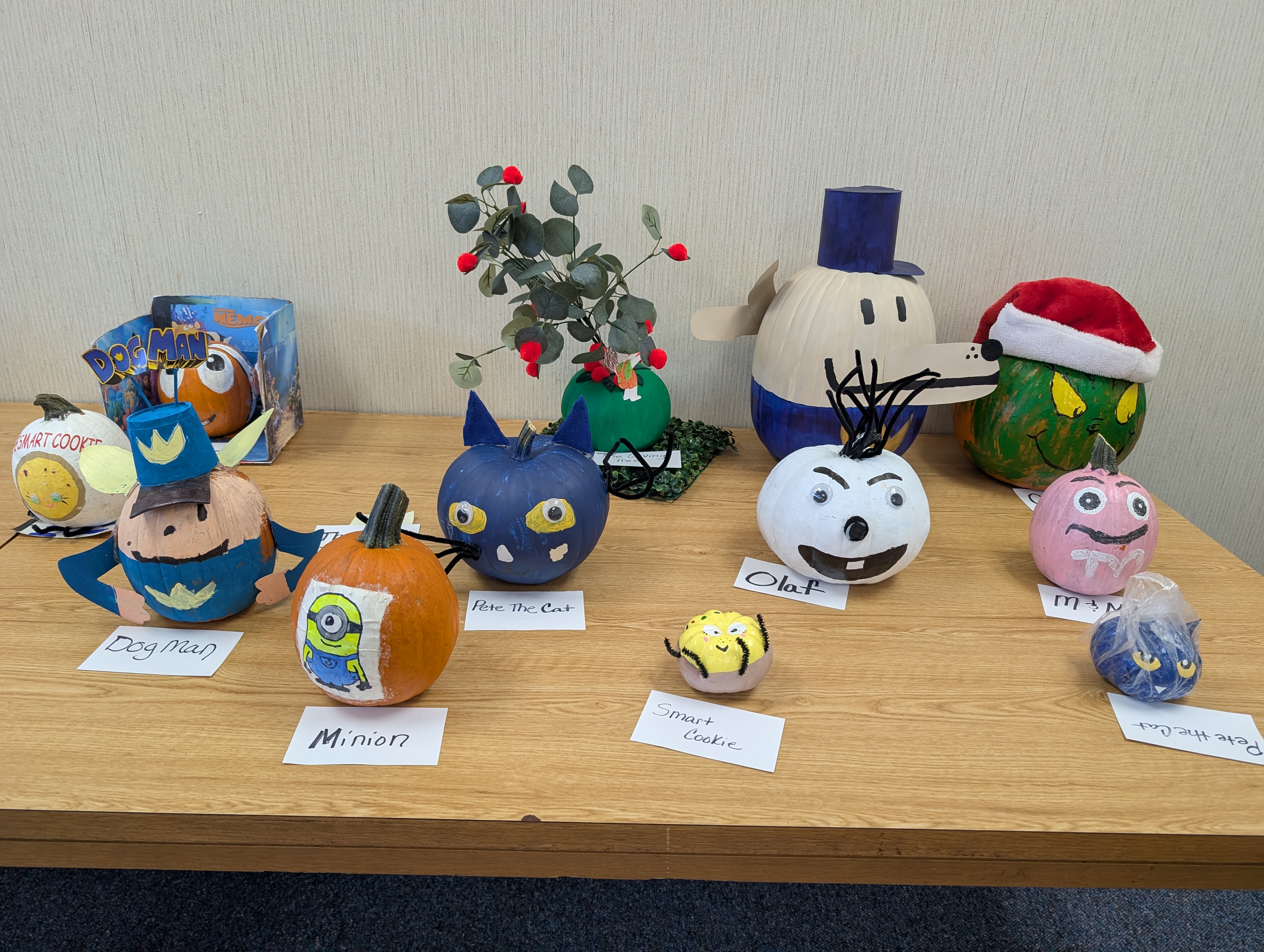 Book character pumpkins painted by West Rusk elementary students